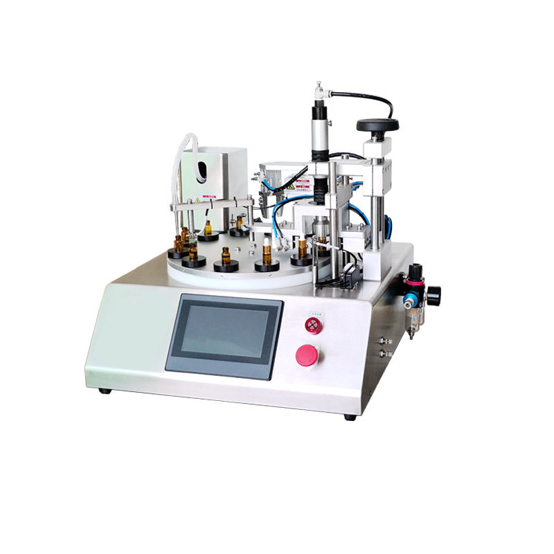 Diagnostic reagent filling and capping machine