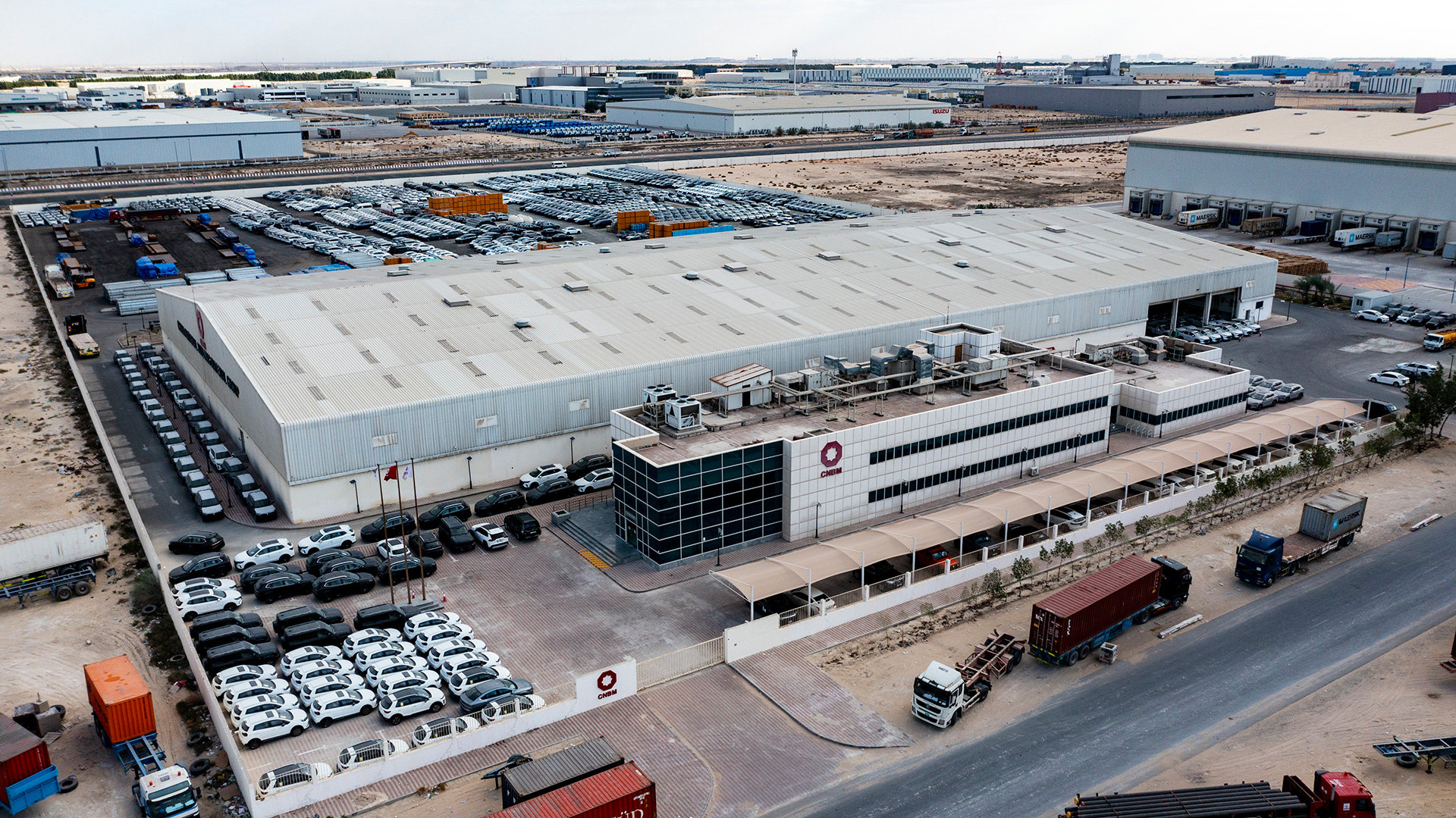 CNBM FZE flags and warehouse in Jebel Ali Free Zone