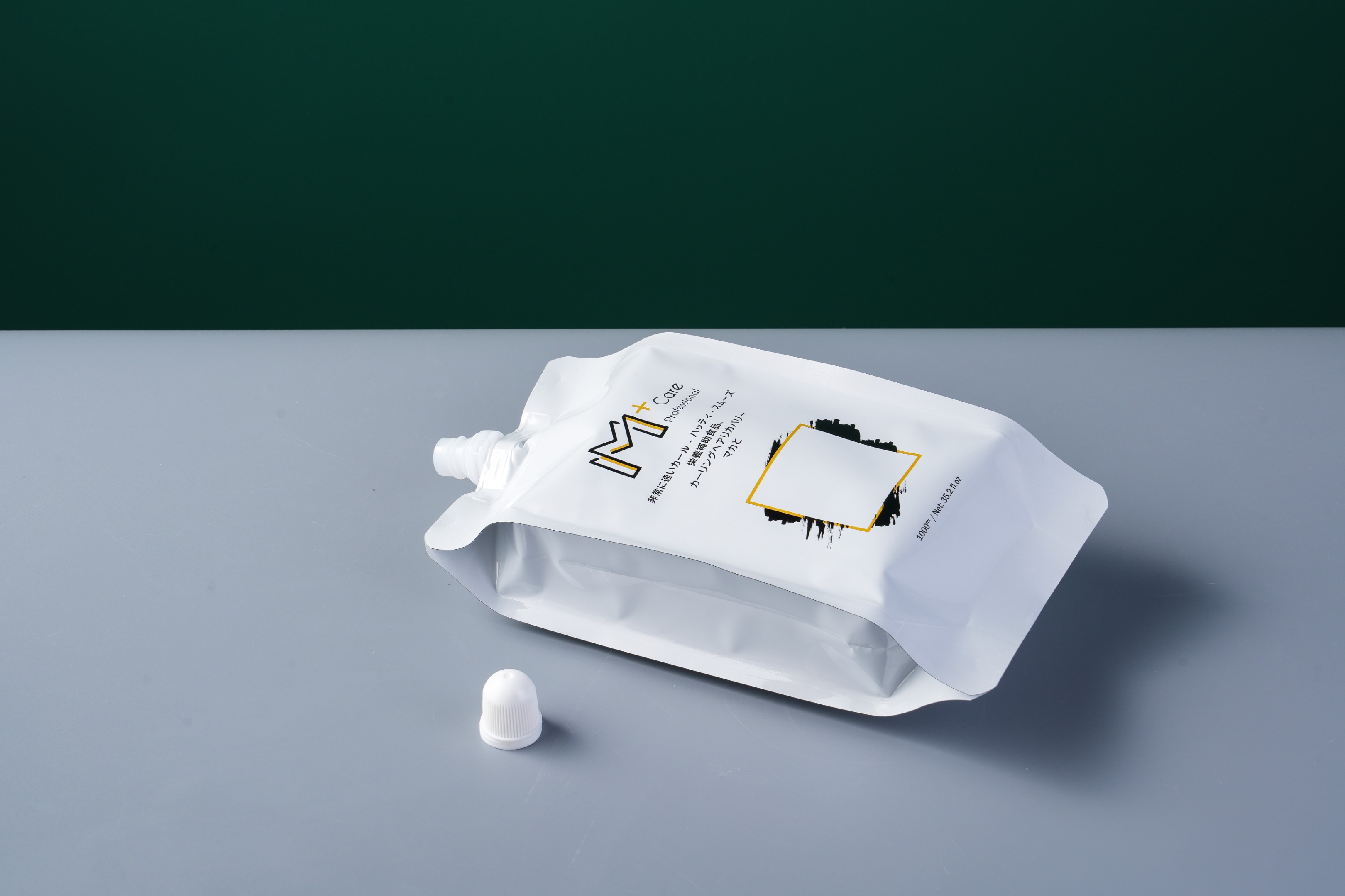 Four-side seal spout pouch