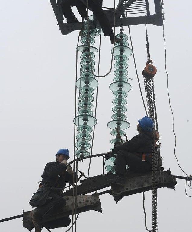 What is suspension insulator used in transmission lines