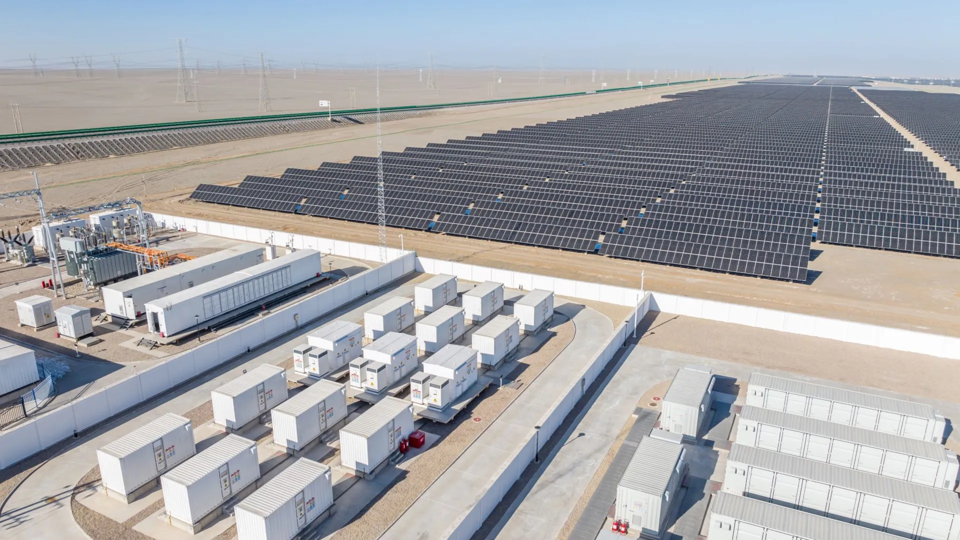 Two workers viewing power grids