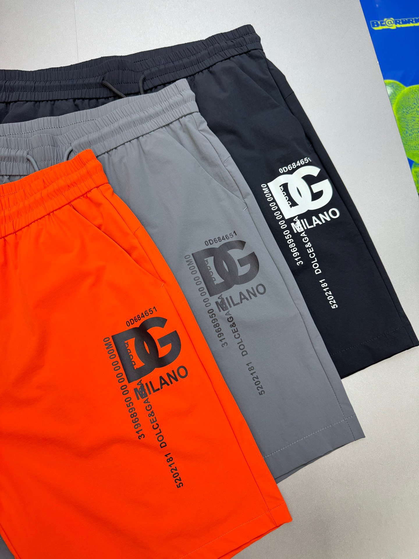 Du's Quick-Dry Sports Casual Shorts, Beach Shorts, Surfing Shorts. Highly recommended for the custom-made style! The material of this pair of shorts is soft, and it can keep you fresh and comfortable even in the hot summer. The fabric is lightweight and durable, super smooth! Super elastic! It's really super nice-looking and easy to wear! Classic letter DG heat transfer printing process. It's both age-reducing and fashionable.