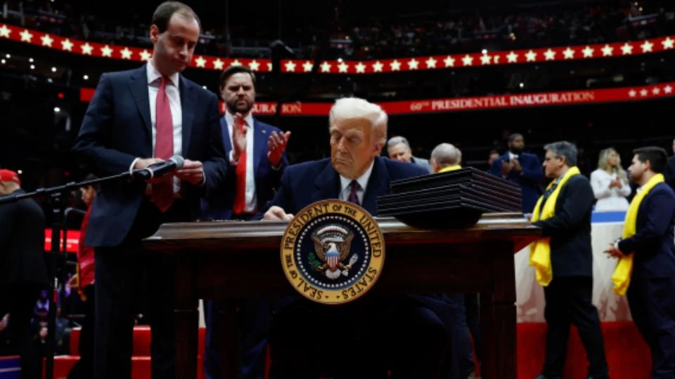 Trump orders U.S. to exit Paris climate accord, signs 7 more executive orders