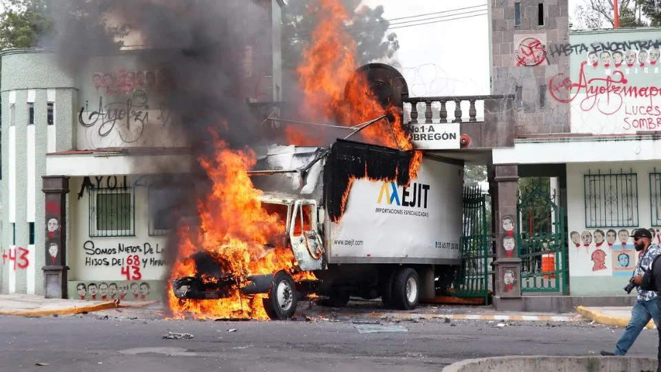 Military camp vandalized in Mexico City; truck burned in protest of Ayotzinapa